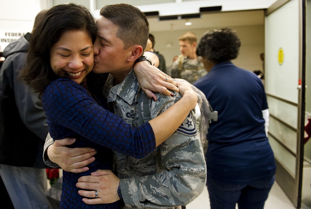 Tech Sgt. Cecilio Ricardo kissed his wife, Lalaine, when he arrived at Baltimore Washington International Airport in Baltimore on Dec. 20, 2011. He was a part of the last Air Force personnel group to return home from Iraq.
Tech Sgt. Cecilio Ricardo kissed his wife, Lalaine, when he arrived at Baltimore Washington International Airport in Baltimore on Dec. 20, 2011. He was a part of the last Air Force personnel group to return home from Iraq.