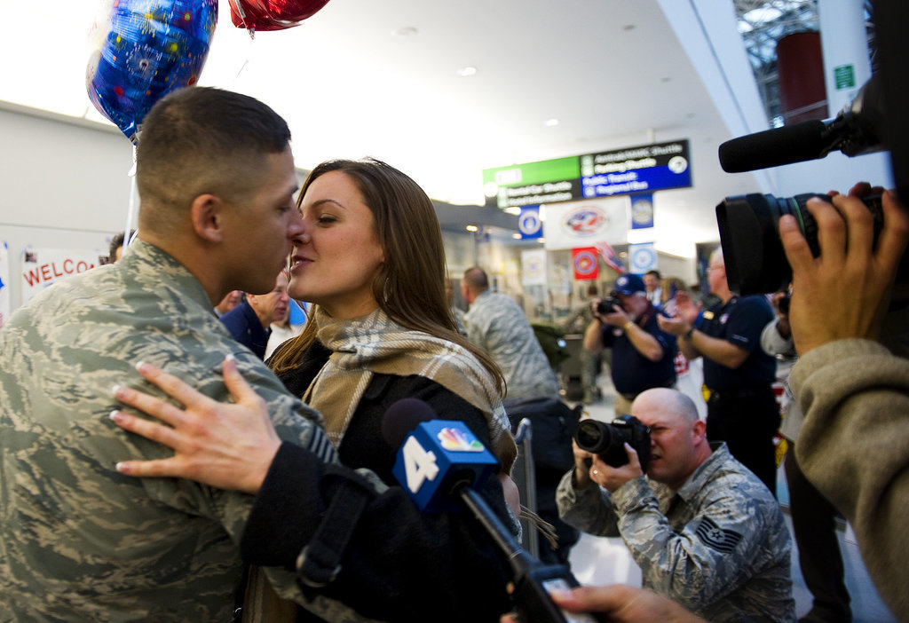 A couple shared a not-so-private kiss upon the return home of the 300 Airmen, the last Air Force personnel from Iraq, at Baltimore Washington International Airport in Baltimore on Dec. 20, 2011.
A couple shared a not-so-private kiss upon the return home of the 300 Airmen, the last Air Force personnel from Iraq, at Baltimore Washington International Airport in Baltimore on Dec. 20, 2011.