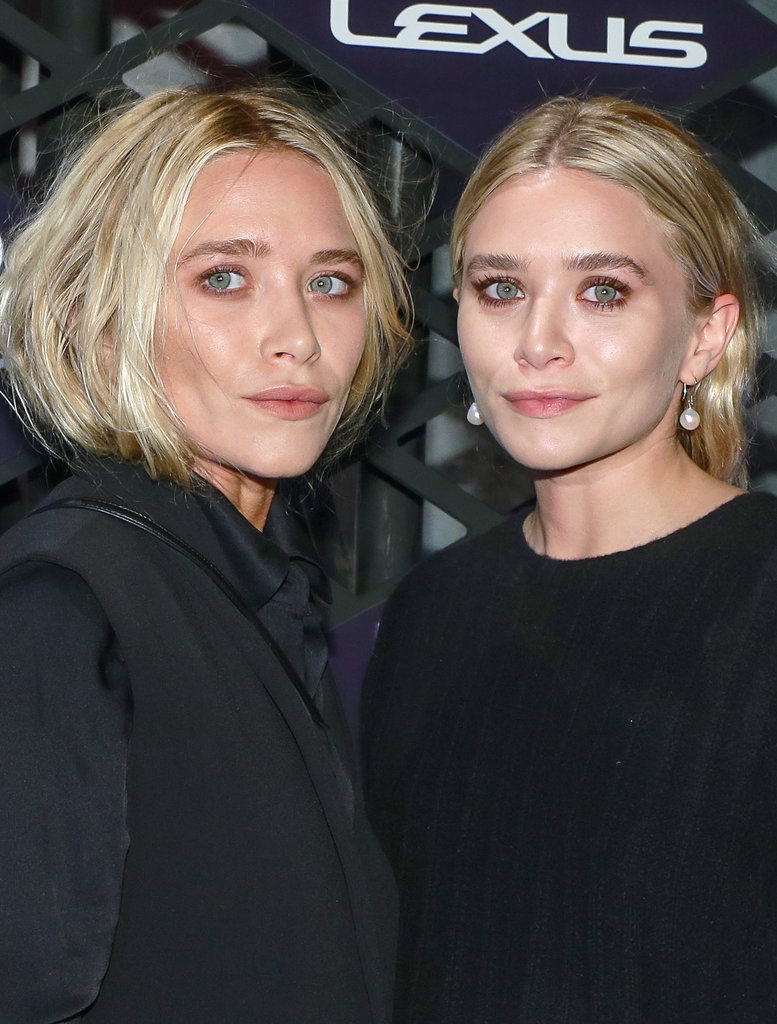 Later in 2013, the pair rocked on-trend pink eye makeup at the Lexus Design Disrupted Event. Mary-Kate also changed up her style by wearing her blond hair tucked into her outfit.
Later in 2013, the pair rocked on-trend pink eye makeup at the Lexus Design Disrupted Event. Mary-Kate also changed up her style by wearing her blond hair tucked into her outfit.