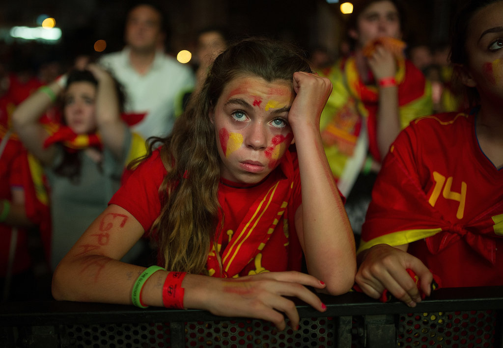 In Madrid, a Spanish soccer fan looked nervous as she watched her team play against the Netherlands.
In Madrid, a Spanish soccer fan looked nervous as she watched her team play against the Netherlands.
