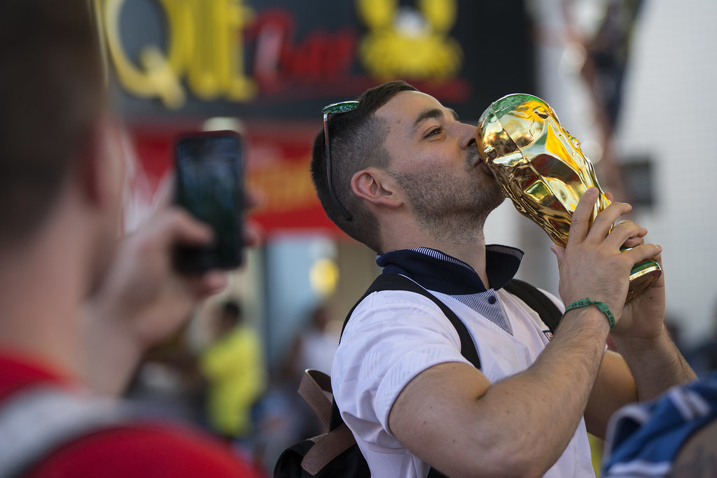 An England fan posed with a World Cup statue in Manaus, Brazil.
An England fan posed with a World Cup statue in Manaus, Brazil.