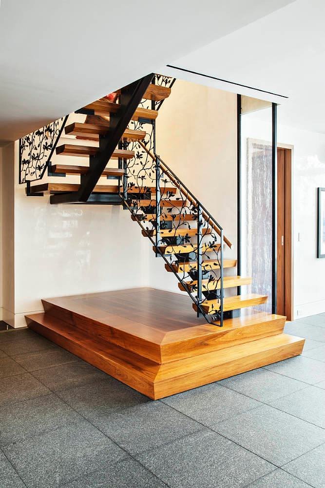 This staircase serves as functional art. 
Source: Town Real Estate
