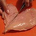 Remove the smaller piece of meat from the breast.