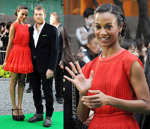 Zoe Saldana Attends Tokyo Film Festival in an Red Orange Ruffle Dress and Black Platforms