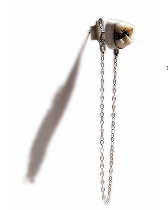 Jewelry Made Out of . . . Human Teeth and Hair! 