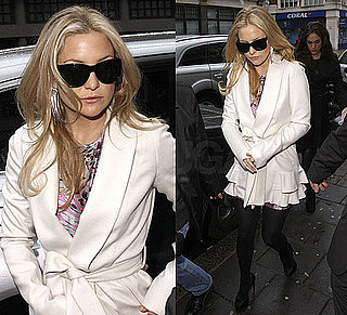 Photo of Kate Hudson in London Wearing Ruffled Ivory Coat