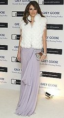 Photo of Elizabeth Hurley Wearing Lavender Dress and White Fur Vest at Grey Goose Vodka Fundraiser in London Photo of Elizabeth Hurley Wearing Lavender Dress and White Fur Vest at Grey Goose Vodka Fundraiser in London