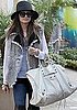 Nicole Richie Holiday Shopping at The Grove in LA in Fur Vest and Big White Balenciaga Bag