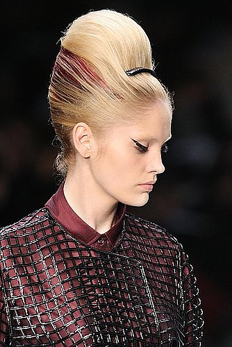 Makeup: YSL did "Fellini eyes" but it wasn't the only time we saw dramatic liner on catwalk lids. Makeup: YSL did "Fellini eyes" but it wasn't the only time we saw dramatic liner on catwalk lids.