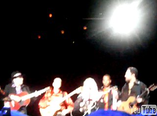 Video of Madonna Breaking Down, Pays Tribute to Two Dead Men at Her Italy Concert Last Night
