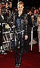 Sienna Miller Attends G.I. Joe Premiere in Tokyo Wearing a Shiny Gucci Suit