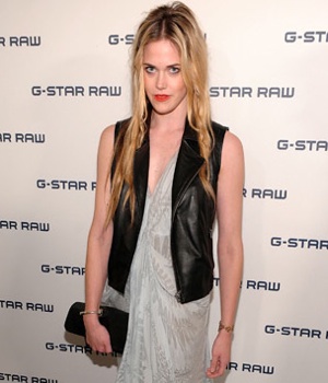 Photo of Byrdie Bell Wearing Leather Vest and Maxi Dress at New York Fashion Week