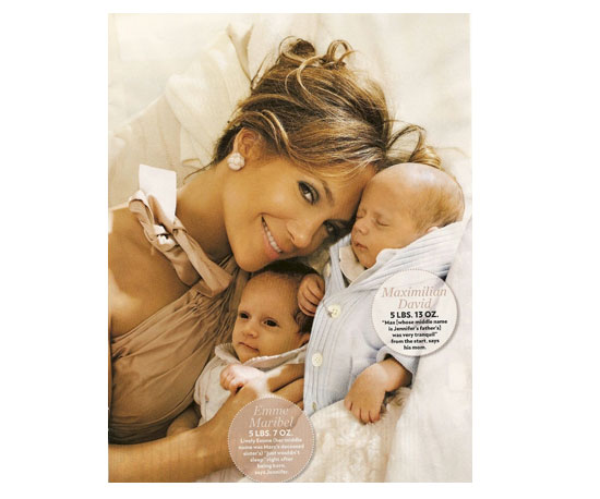 Jennifer Lopez snuggles with . . . 