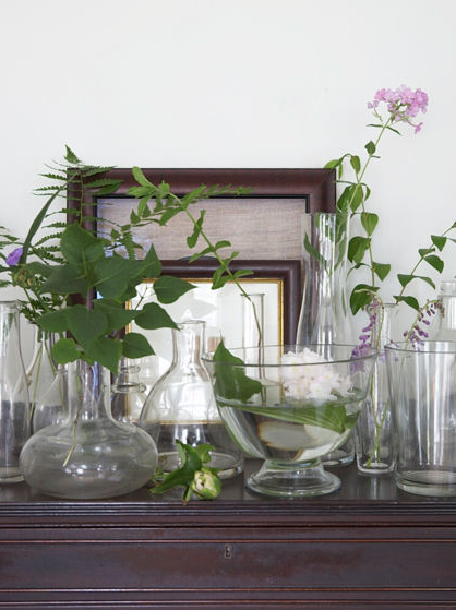 Botanicals on the mantel say Summer instantly. Use clear glass vessels to keep the feel ethereal.
Source
Botanicals on the mantel say Summer instantly. Use clear glass vessels to keep the feel ethereal.
Source