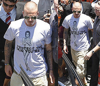 Becks Protects The Skin He's In With Posh on His Pecs
