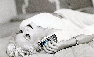 Madonna Sleeps With Her BlackBerry