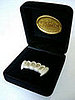 The Scoop: Snoop Dogg's Dogs Get Grillz