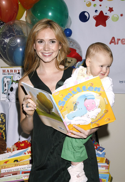 Ashley Jones and niece Finley read Smitten. Ashley Jones and niece Finley read Smitten.