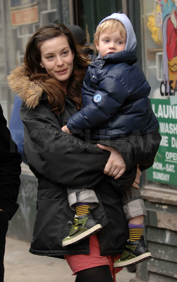 Liv Tyler and son Milo braved a little NYC rain. Liv Tyler and son Milo braved a little NYC rain.