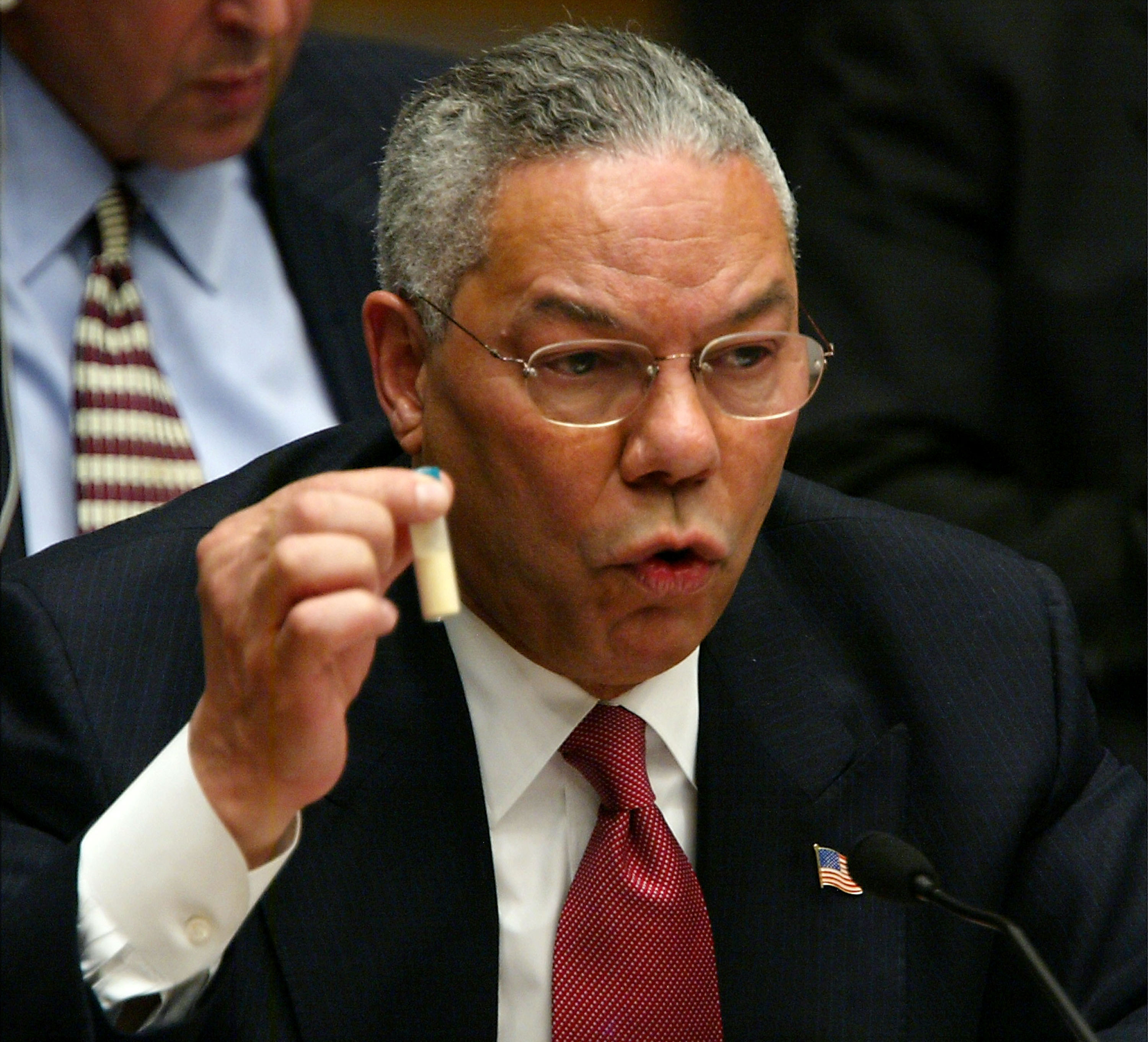Sec. of State Powell holds a viral of anthrax while telling the UN that Iraq is hiding WMD. Feb 5, 2003. Sec. of State Powell holds a viral of anthrax while telling the UN that Iraq is hiding WMD. Feb 5, 2003.