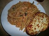 Shrimp Penne in Cream Sauce With Cheesy Garlic Bread Shrimp Penne in Cream Sauce With Cheesy Garlic Bread
