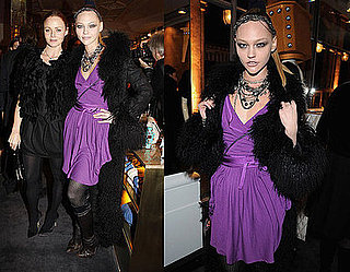 Model Sasha Pivarova Attends The Parisian Stella McCartney Store Opening in Purple Wrap Dress