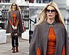 Claudia Schiffer in London Wearing a Cape and Moccasins