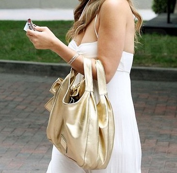 Guess Which Celeb Is Carrying a Gold Metallic Valentino? 