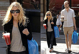 Ashley Olsen in long black coat in the streets of New York