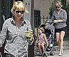 Michelle Williams in a black and white gingham shirt with baby Matilda