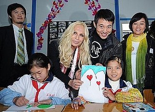 Donatella Versace And Jet Li Visits Earthquake Zone In China