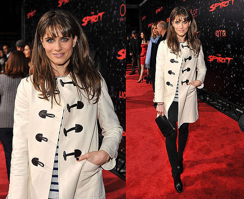 Amanda Peet Attends "The Spirit" Los Angeles Premiere in an Ivory Toggle Coat