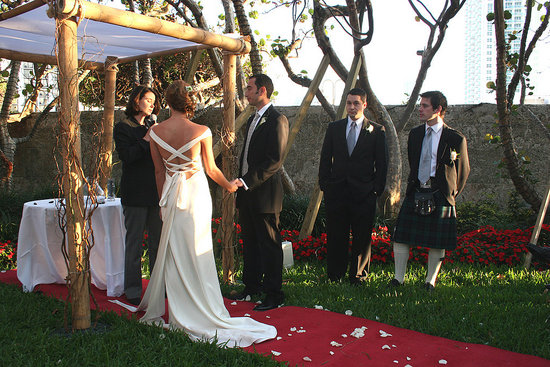 Bride, groom, groomsman and best man.