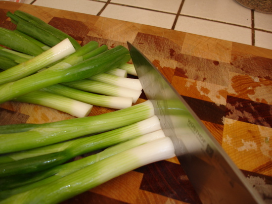 Use the white parts of the scallions, plus about two inches of green Use the white parts of the scallions, plus about two inches of green