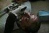 Little Dog Kisses Passed Out Guy