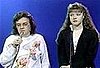 Mother and Daughter Singing Christmas Tunes on Public Access