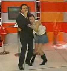 TV Host Gets Hair Stuck to Singer TV Host Gets Hair Stuck to Singer
