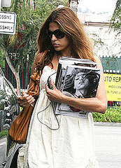 Eva Mendes Keeps Her Headphones in and Her Hands Free Eva Mendes Keeps Her Headphones in and Her Hands Free