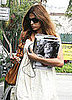 Eva Mendes Keeps Her Headphones in and Her Hands Free 