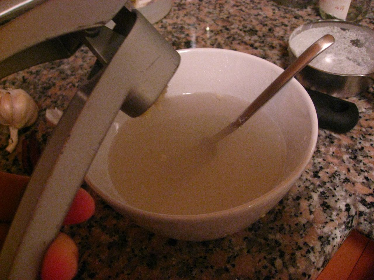 Add garlic to the liquid. Add garlic to the liquid.