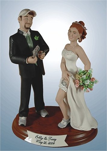 While I think custom cake toppers are a neat idea, I highly recommend thinking twice about what you have done. While this may have fit Bobby and Tracy's personalities well, I can't imagine what my mom would say over this cake topper.
While I think custom cake toppers are a neat idea, I highly recommend thinking twice about what you have done. While this may have fit Bobby and Tracy's personalities well, I can't imagine what my mom would say over this cake topper.