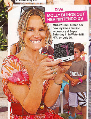 Molly Sims Plays With Her Crystal Encrusted Nintendo DS