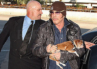 Mickey Rourke and Loki Leave LAX After His First Award at the Golden Globes