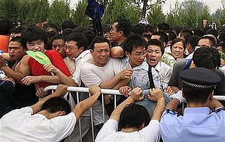 Fights Break Out As Chinese Stampede For Last Olympic Tickets