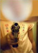 Dad Forces Six-Year-Old to Pose With Pistol For Pictures