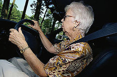 Grandma Drives with Child on Top of Car Grandma Drives with Child on Top of Car