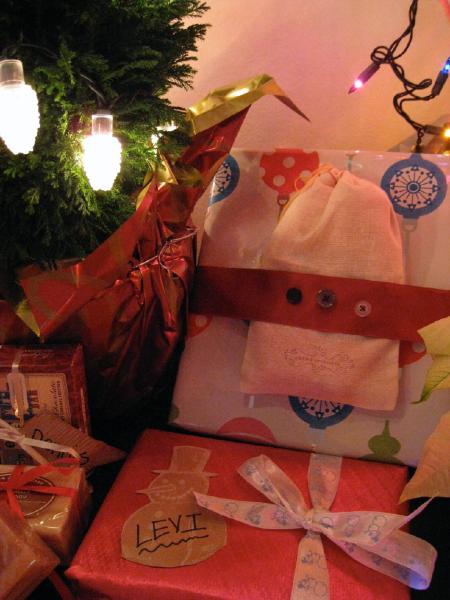 Close up of handmade gifts; the "button ribbon" was a cute idea I stole from Anthropologie & I made gift tags out of TJ's bags Close up of handmade gifts; the "button ribbon" was a cute idea I stole from Anthropologie & I made gift tags out of TJ's bags
