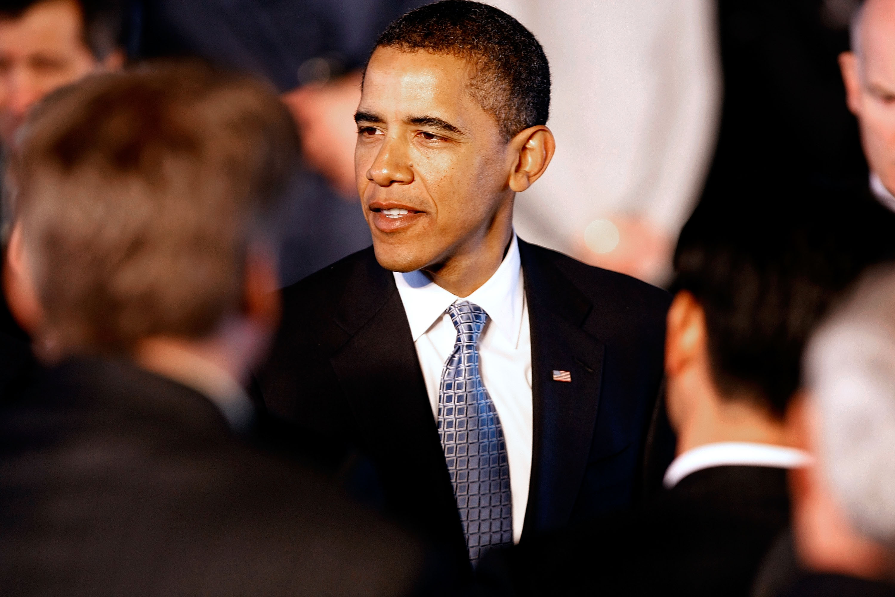 Obama greets people after addressing the gathering of workers and leaders from the wind energy industry. Obama greets people after addressing the gathering of workers and leaders from the wind energy industry.