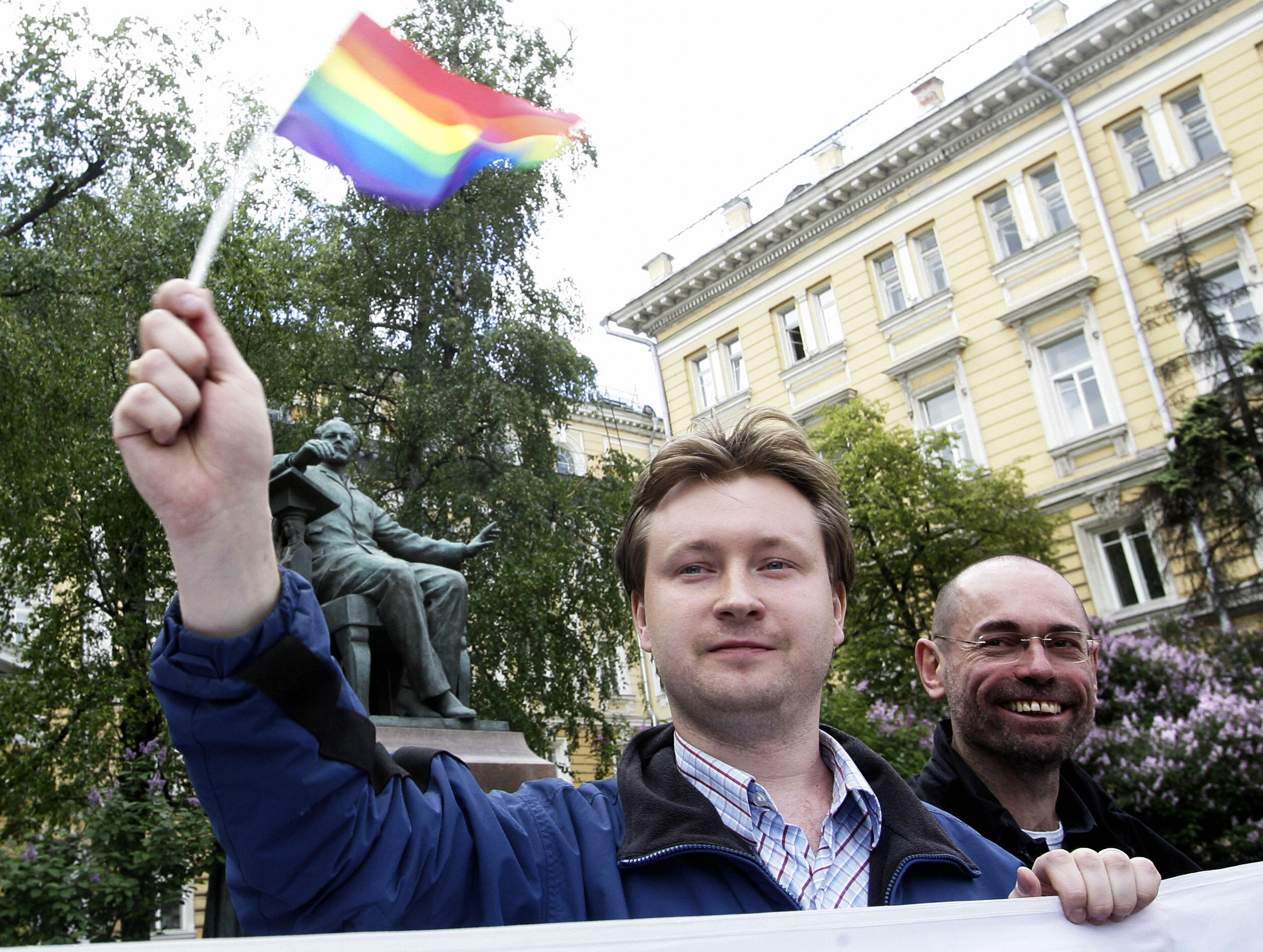 Russian gay community leader Nikolai Alexeyev waves a flag. Russian gay community leader Nikolai Alexeyev waves a flag.