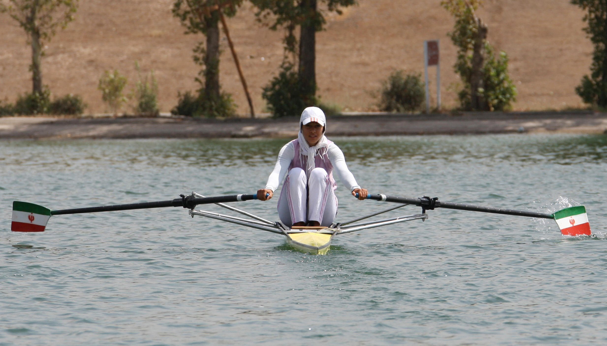 Homa trains at Azadi Stadium's artificial lake in Tehran. Homa trains at Azadi Stadium's artificial lake in Tehran.